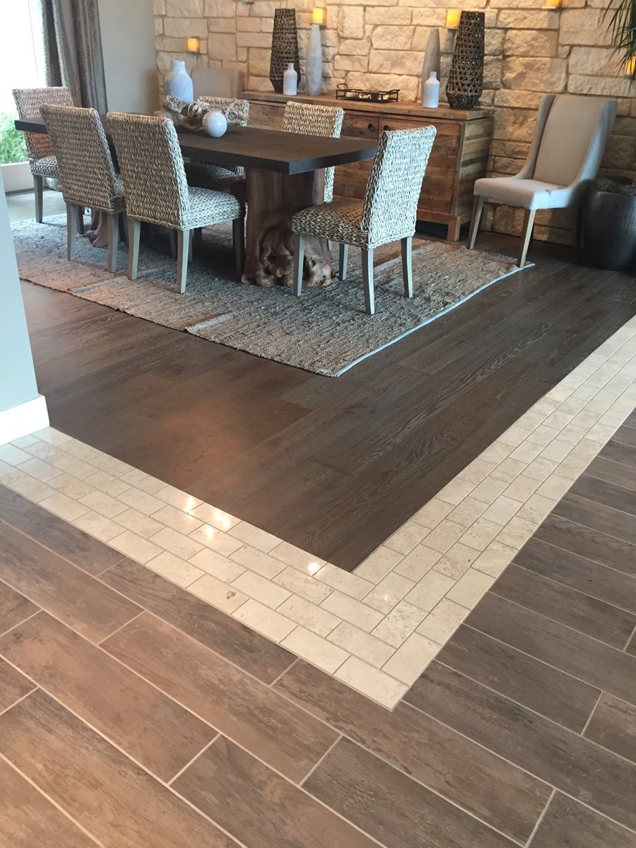 dining room with a mix of tile and laminate flooring installation from Creative Home Enhancements Inc in Anthem, AZ